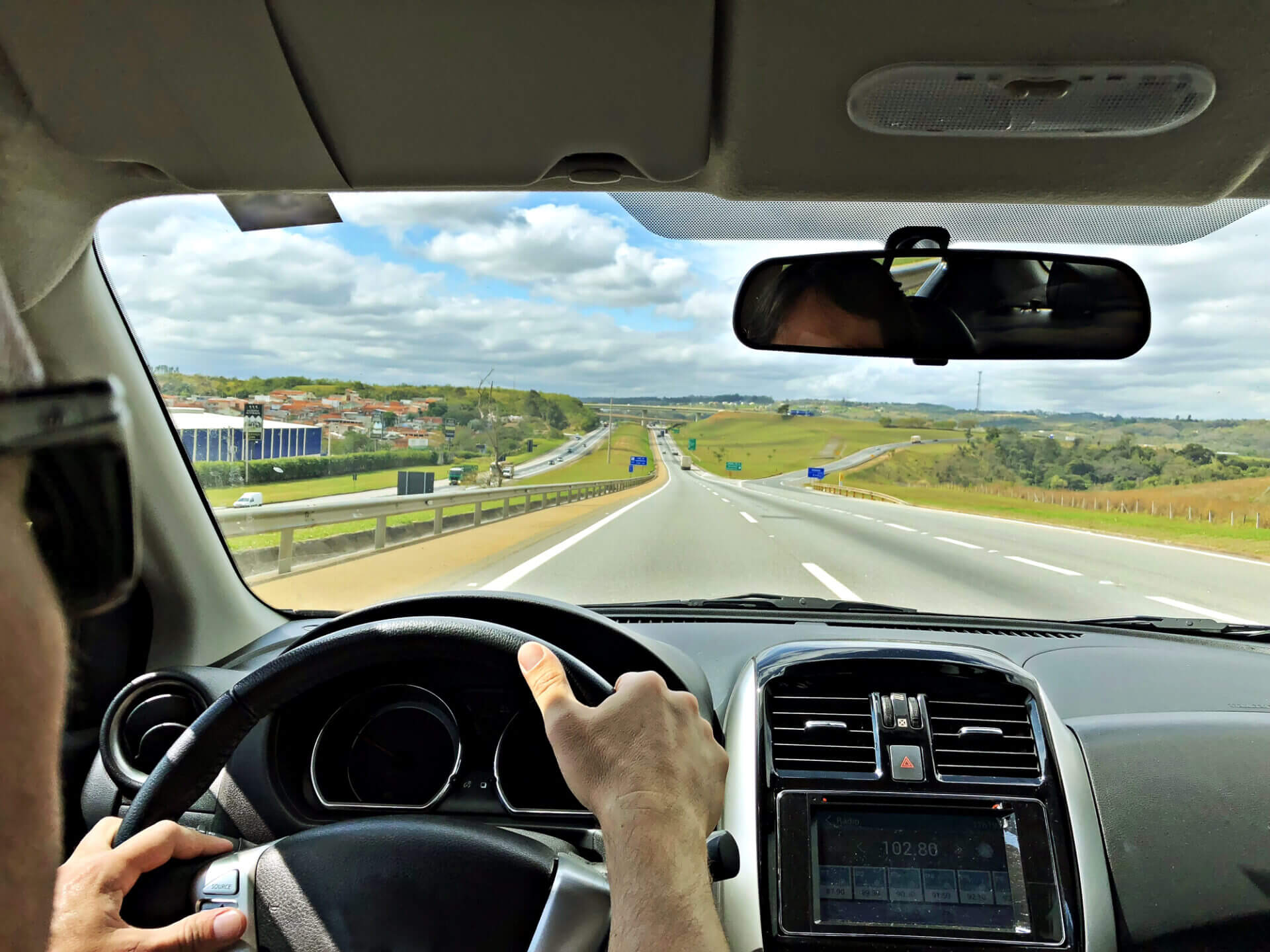 Pov Of A Man Driving A Car On The Roads Of Brazil.